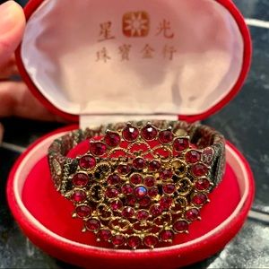 Beautiful bracelet with red stones
